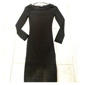 Long black form fitting dress